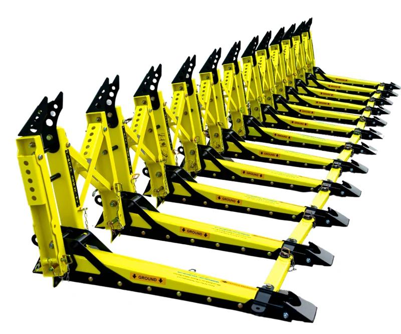 Rows of yellow and black MVB3X modular barrier units.