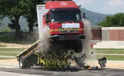 A truck in a vehicle barrier demonstration.