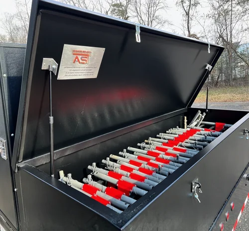 Pivot system components organized inside the trailer storage chest